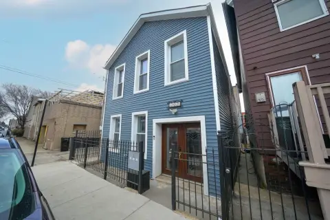 Pilsen Gut-Renovated Three-Unit Property