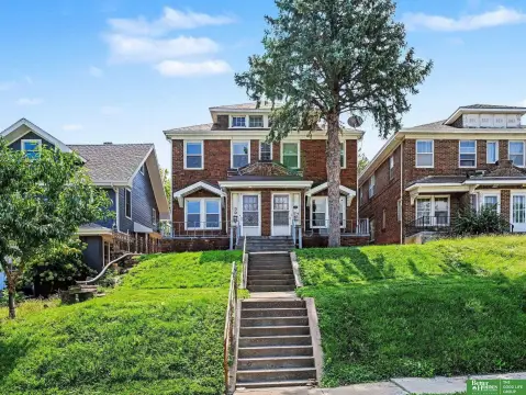 Brick Duplex with Detached Garage