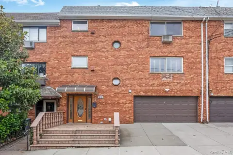 Brick Duplex With Detached Garage