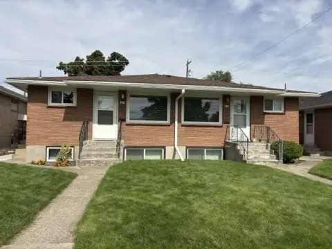 Brick Quadplex With Detached Garages