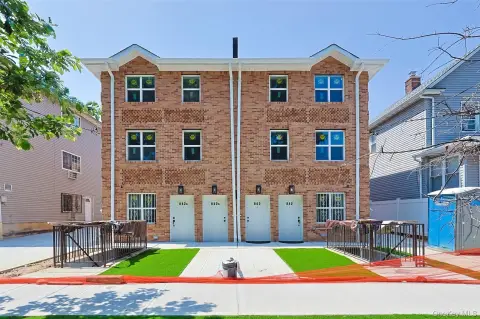 Newly Built Three-Family Brick Home