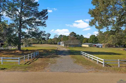 Unrestricted Land with Metal Buildings