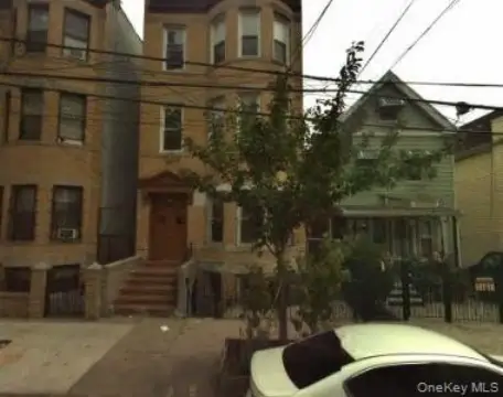Renovated Triplex with Backyard