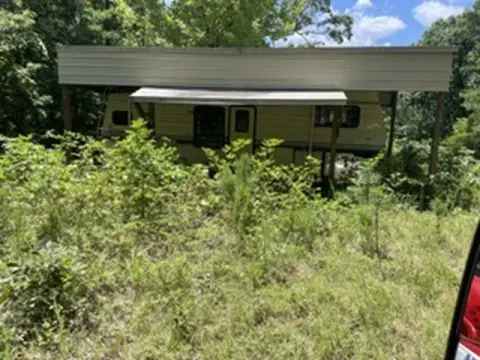 Wooded Land with Camper