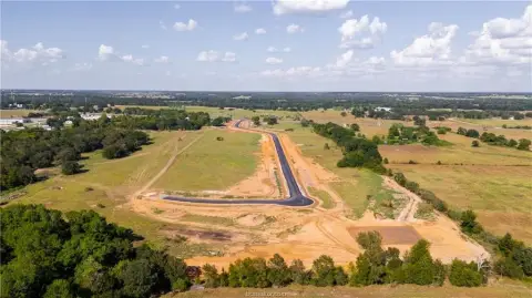 Acreage Lot in Growing Community