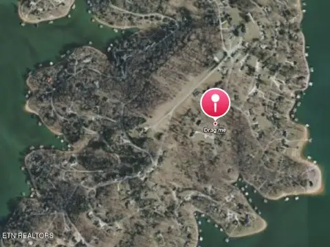 Land with Mountain and Lake Views