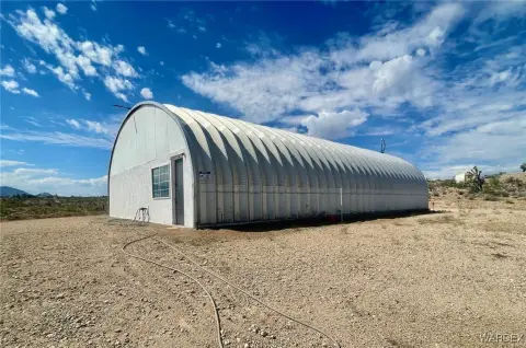 Versatile Quonset Hut on Acre Lot