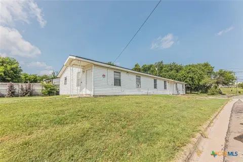 Income-Producing Triplex with Renovated Unit