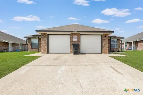 Updated Duplex with Two Fenced Yards