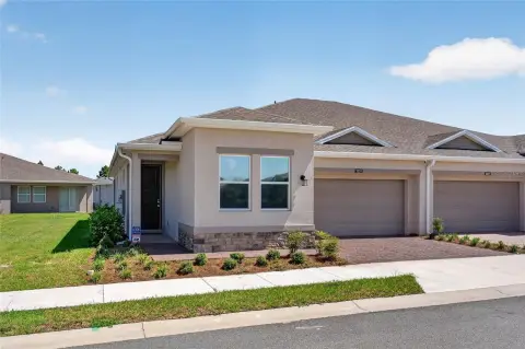 Gated Community Duplex with Screened Porch