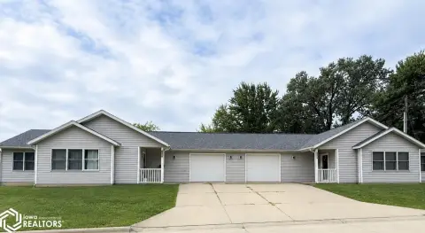 Corner-Lot Duplex with Screened Porches