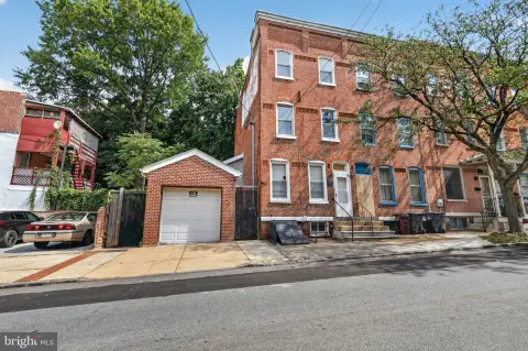 Brick Triplex with Detached Garage