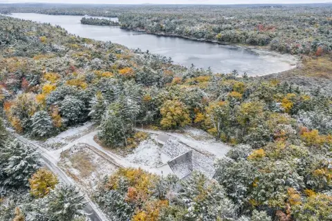 Waterfront Land with Existing Improvements