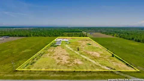 Fenced Agricultural Land with Improvements