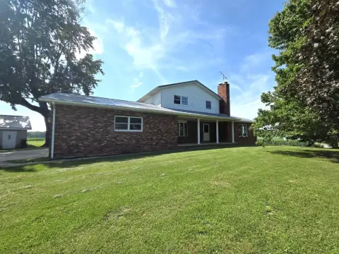 Farmhouse with Grain Bins