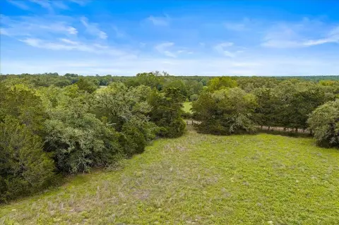 Unrestricted Land with Pond, Trees