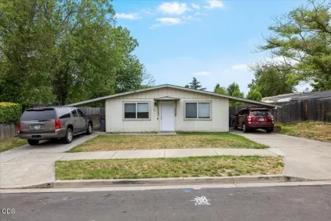 Duplex with Fenced Yards and Carports