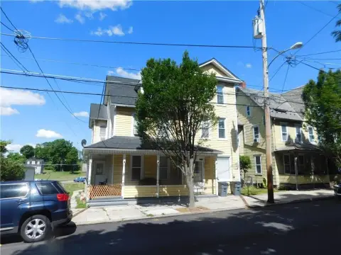 Side-by-Side Twin Homes with Buildable Lot