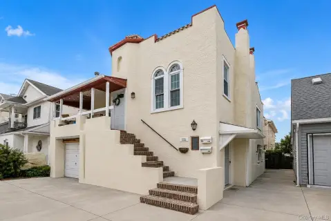 Vacant Two-Unit Cape Cod