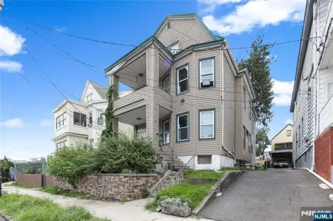 Multifamily Home With Bonus Apartment