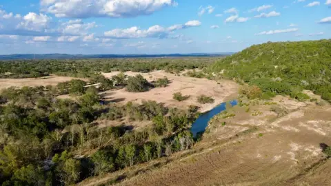 Vacant Hill Country Acreage with Creek Access