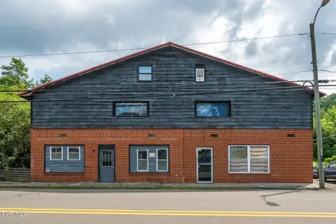 Apartment Building with Creek Backdrop