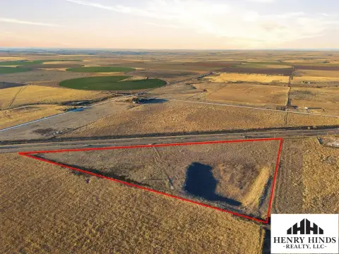 Fenced Farmland Tract with Highway Frontage