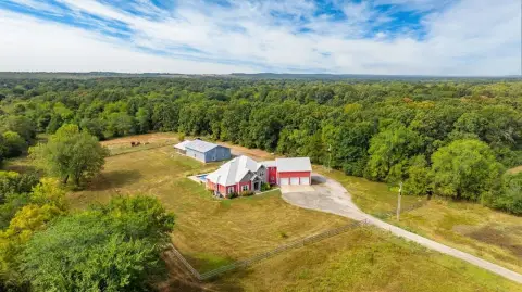 Spacious Estate with Acreage and Shop