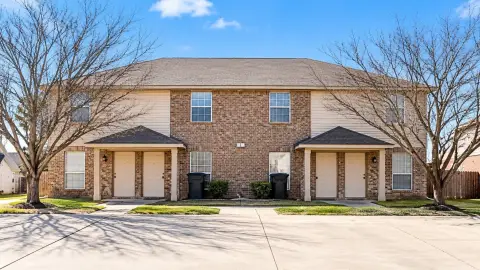 Brick Quadplex with Open Parking