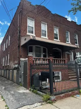Semi-Attached Two-Family Brick Home