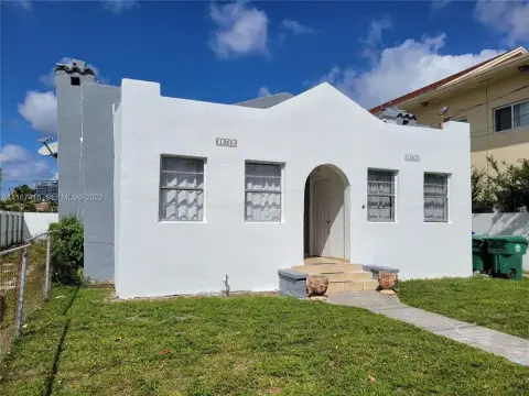 Tenant-Occupied Fourplex with Duplex Buildings