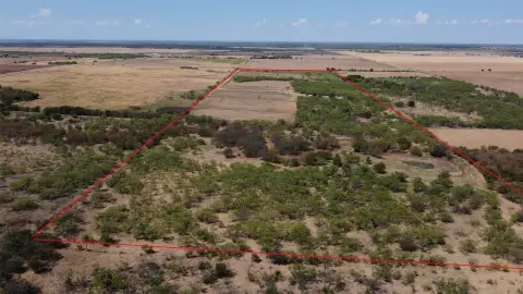 Fenced Agricultural Land With Ponds