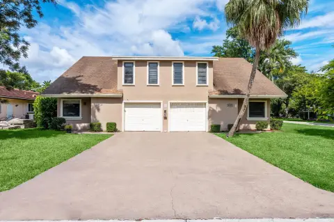 Corner-Lot Duplex with Shared Pool