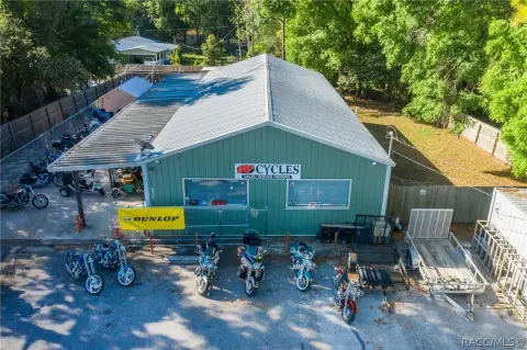 Fenced-Yard Auto Shop
