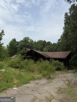 Land with Existing Residence