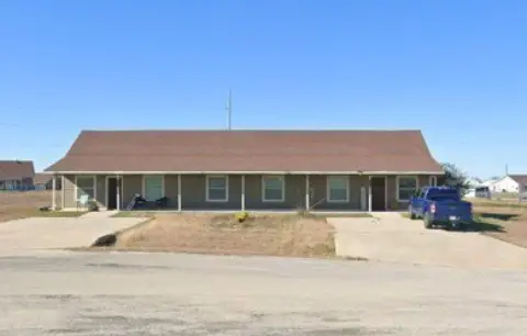 Well-Maintained Duplex with Covered Patio