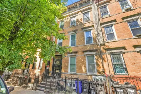 Three-Family Home with Bonus Rear