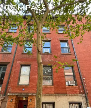 Four-Floor Red Brick Rental Building