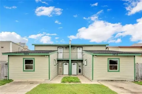 Party-Wall Duplex With Private Entrances