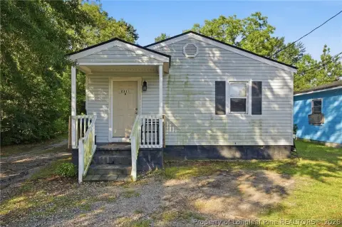 Updated Duplex with Occupied Units