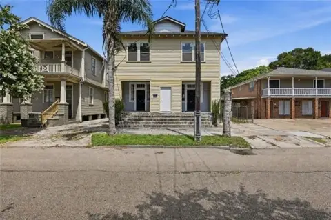 Two-Story Duplex with Unfinished Addition