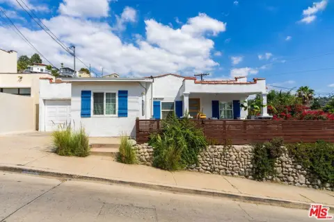 Spanish-Style Duplex with Studio