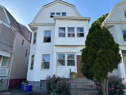 Three-Story Duplex with Backyard