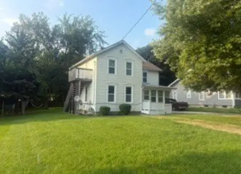 Duplex With Detached Two-Car Garage