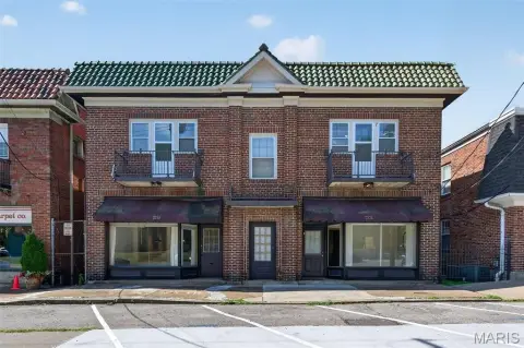 Quadplex with Commercial Lower-Level Units