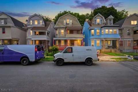 Three-Unit Triplex with Backyard