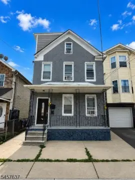Two-Residence Duplex with Updated Systems