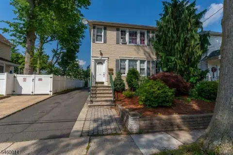 Two-Story Duplex with Detached Garage