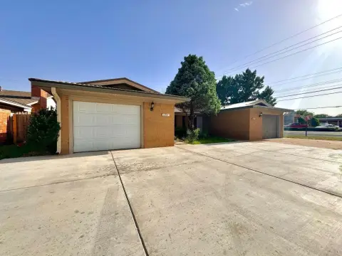 Brick Duplex with Occupied Units