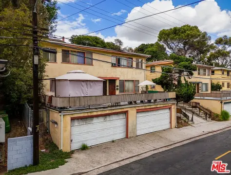 Four-Unit Multifamily Property with Deck
